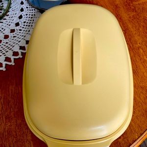 Tupperware Steam and Serve bowl in yellow